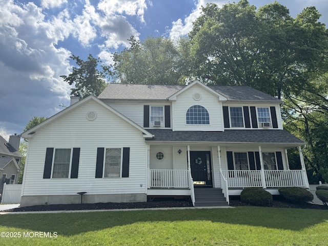 20 Northgate Dr, Englishtown, NJ 07726 - view of front of property with a porch, a front yard, a chimney, and a shingled roof
