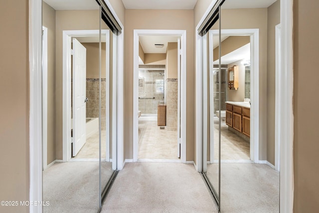 36C Canterbury Dr, Monroe, NJ 08831 - corridor featuring light colored carpet