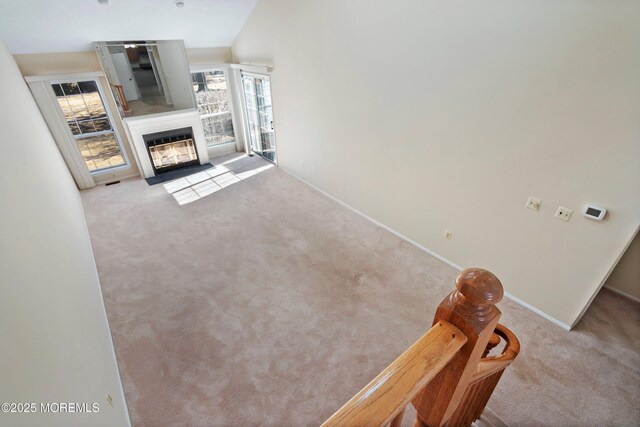 36C Canterbury Dr, Monroe, NJ 08831 - living room featuring carpet flooring, a fireplace with flush hearth, and baseboards