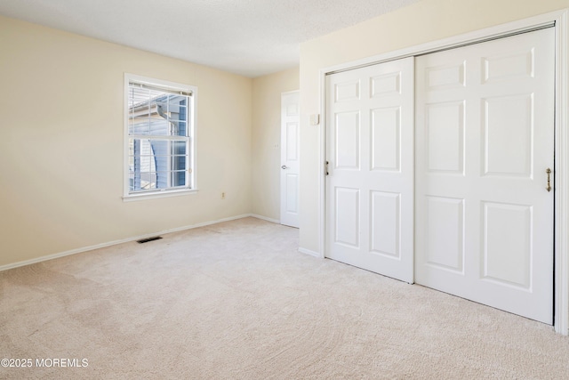 36C Canterbury Dr, Monroe, NJ 08831 - unfurnished bedroom with carpet floors, a closet, and baseboards