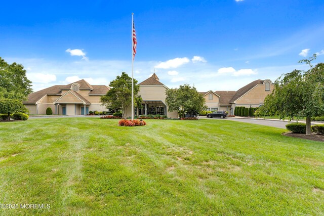 36C Canterbury Dr, Monroe, NJ 08831 - view of front of house with a front lawn