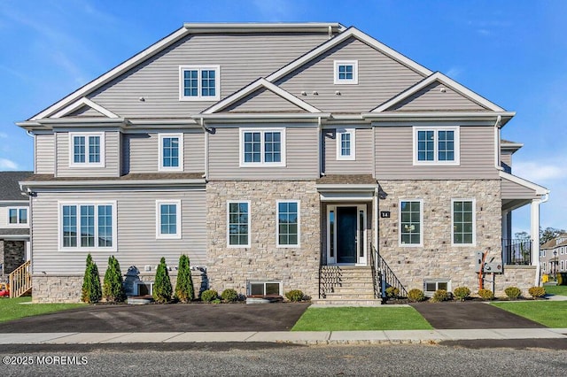 14 Blue River Way, Lakewood, NJ 08701 - townhome / multi-family property featuring stone siding and entry steps