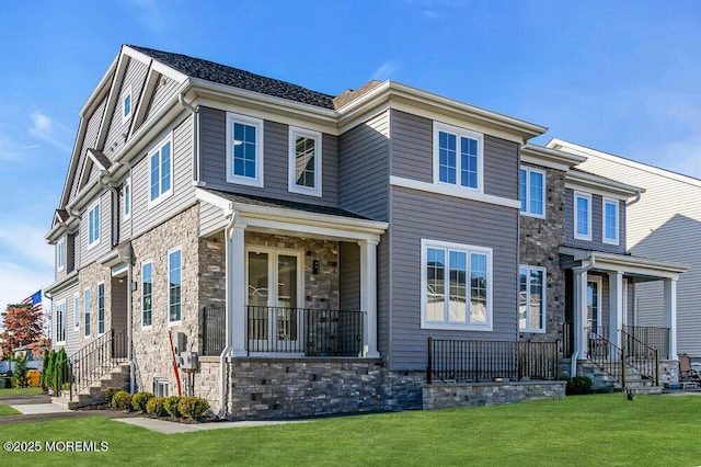 14 Blue River Way, Lakewood, NJ 08701 - view of front of house featuring stone siding and a front lawn