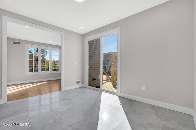 14 Blue River Way, Lakewood, NJ 08701 - empty room with marble tiled floors, baseboards, and recessed lighting