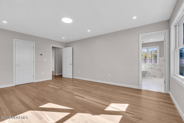 14 Blue River Way, Lakewood, NJ 08701 - unfurnished bedroom with light wood-type flooring, ensuite bathroom, baseboards, and recessed lighting