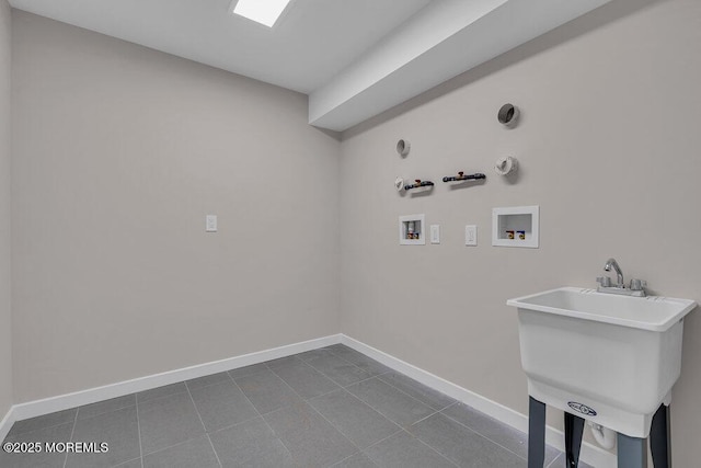 14 Blue River Way, Lakewood, NJ 08701 - laundry area with gas dryer hookup, dark tile patterned floors, hookup for a washing machine, and baseboards
