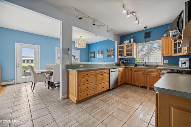 kitchen with dishwasher, a sink, a chandelier, light tile patterned flooring, and glass insert cabinets