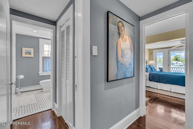7 Sunset Dr, Asbury Park, NJ 07712 - hallway with dark wood finished floors and baseboards