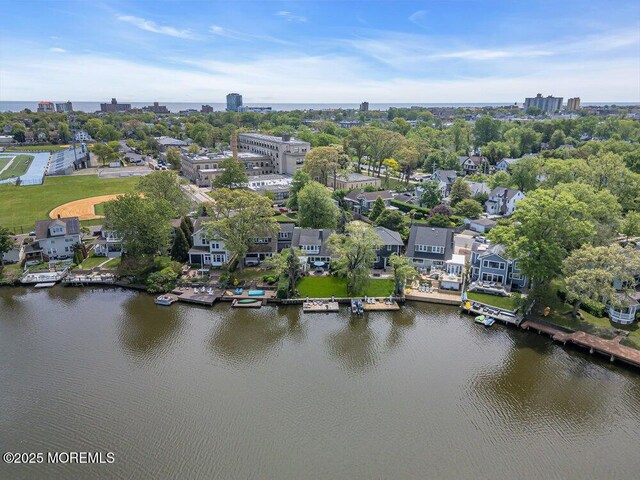 7 Sunset Dr, Asbury Park, NJ 07712 - aerial view of a nearby body of water and a tree filled landscape