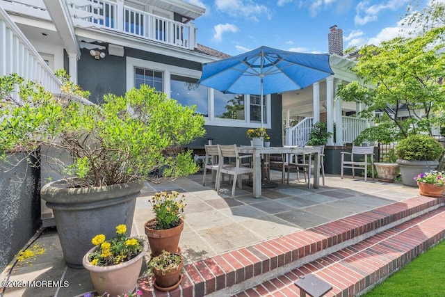 7 Sunset Dr, Asbury Park, NJ 07712 - view of patio / terrace with outdoor dining space and a balcony