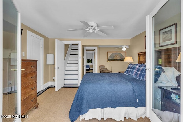 7 Sunset Dr, Asbury Park, NJ 07712 - bedroom with light carpet, ceiling fan, and baseboards