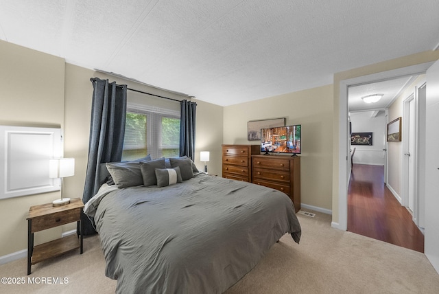 15 Cedar Ct, Manalapan, NJ 07726 - bedroom with light carpet, baseboards, and a textured ceiling