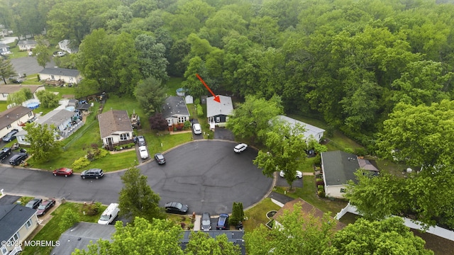 15 Cedar Ct, Manalapan, NJ 07726 - aerial view of property's location with nearby suburban area and a forest