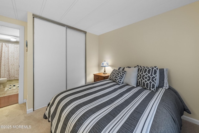 15 Cedar Ct, Manalapan, NJ 07726 - bedroom with light carpet, a closet, and baseboards