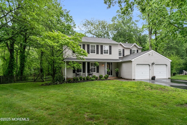 view of front of house with an attached garage, a porch, and driveway