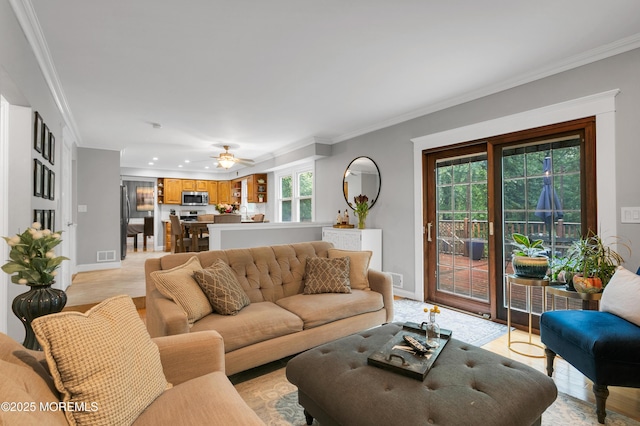 living room featuring light wood finished floors, baseboards, ornamental molding, recessed lighting, and a ceiling fan