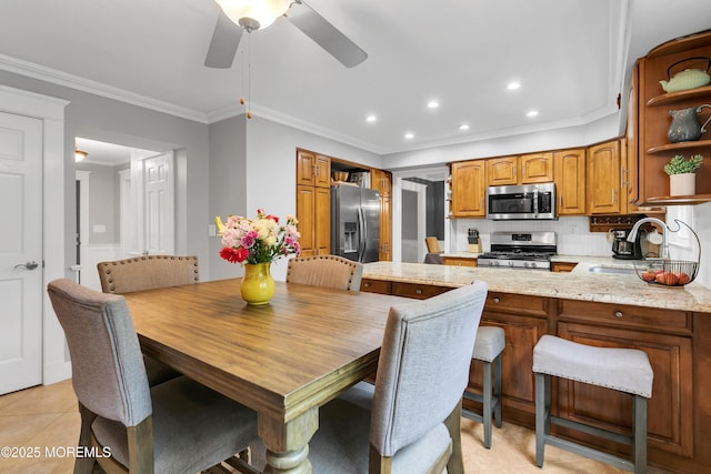 dining area featuring crown molding, recessed lighting, ceiling fan, and light tile patterned floors