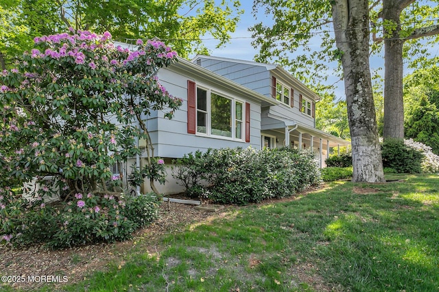 128 Jumping Brook Rd, Lincroft, NJ 07738 - view of property exterior with a lawn