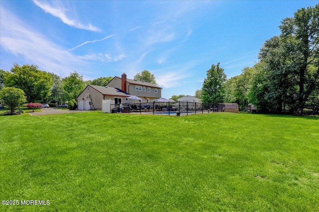 49 Glenbrook Rd, Freehold, NJ 07728 - view of yard featuring an attached garage