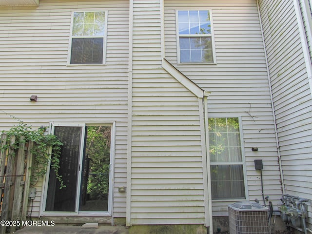 127 Meli Ln, Jackson, NJ 08527 - rear view of property featuring central AC unit