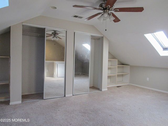 127 Meli Ln, Jackson, NJ 08527 - additional living space featuring a skylight, lofted ceiling, carpet floors, a ceiling fan, and baseboards
