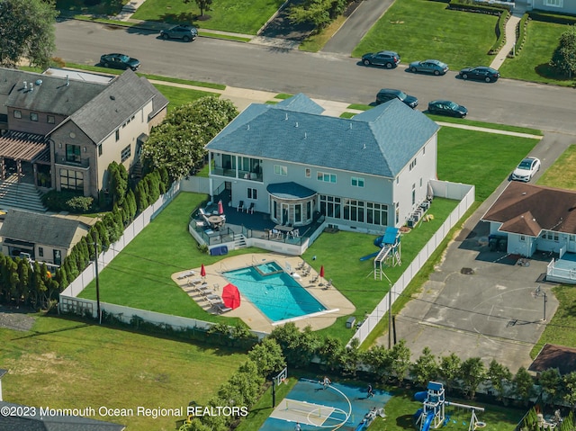 view from above of property featuring a pool