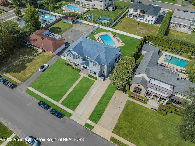 drone / aerial view of a pool area
