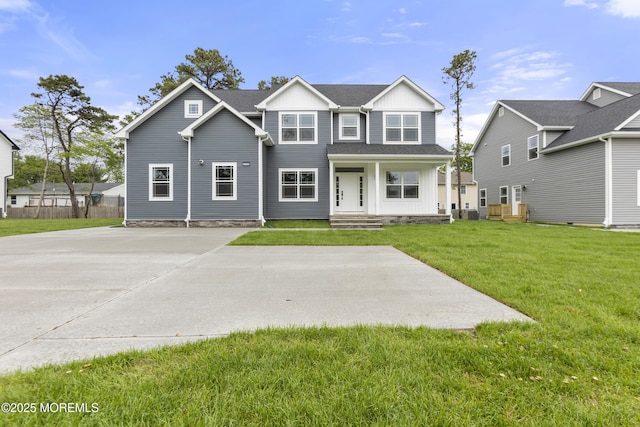 1808 2nd Ave, Toms River, NJ 08757 - view of front of home with board and batten siding and a front lawn