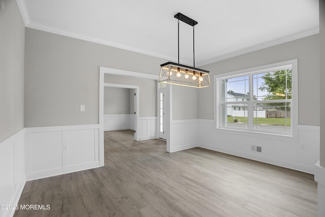 1808 2nd Ave, Toms River, NJ 08757 - unfurnished dining area with crown molding, a chandelier, a wainscoted wall, and wood finished floors