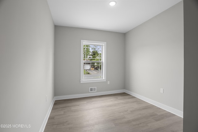 1808 2nd Ave, Toms River, NJ 08757 - empty room with wood finished floors, baseboards, and recessed lighting