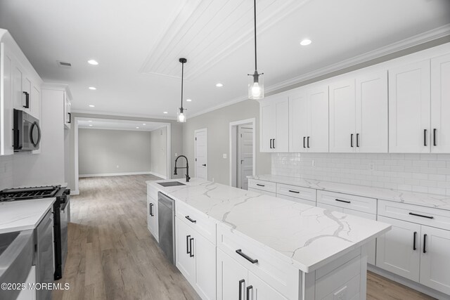 1808 2nd Ave, Toms River, NJ 08757 - kitchen featuring stainless steel appliances, a sink, decorative backsplash, light wood-style flooring, and recessed lighting