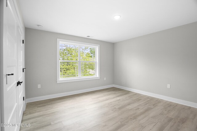 1808 2nd Ave, Toms River, NJ 08757 - unfurnished room with light wood-style flooring, baseboards, and a smoke detector