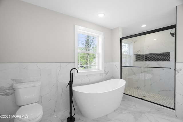 1808 2nd Ave, Toms River, NJ 08757 - bathroom with a marble finish shower, a wainscoted wall, a soaking tub, marble finish floors, and tile walls