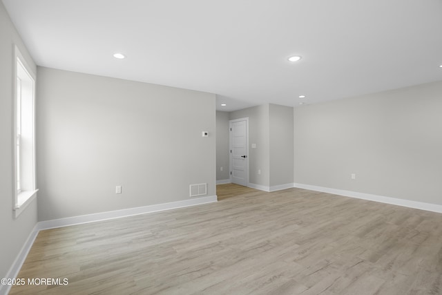 1808 2nd Ave, Toms River, NJ 08757 - empty room with light wood finished floors, baseboards, recessed lighting, and plenty of natural light