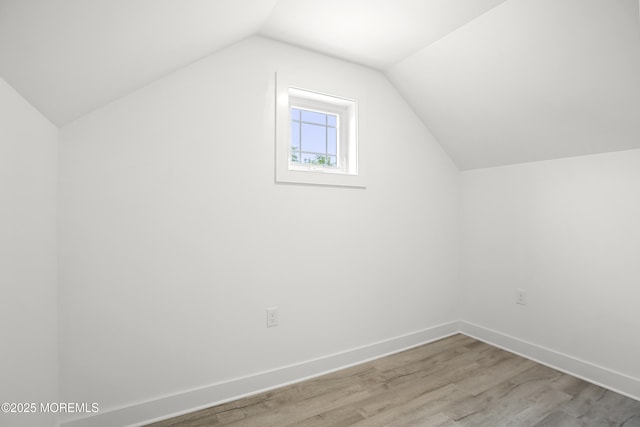 1808 2nd Ave, Toms River, NJ 08757 - additional living space with wood finished floors, lofted ceiling, and baseboards