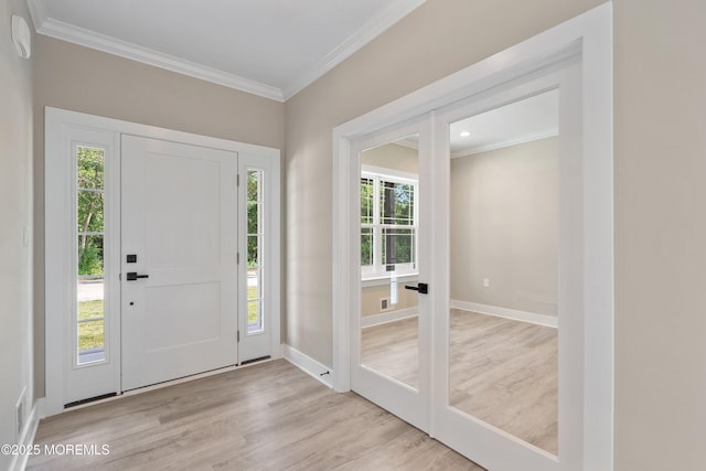 1808 2nd Ave, Toms River, NJ 08757 - foyer entrance with crown molding, wood finished floors, and french doors