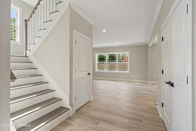 1808 2nd Ave, Toms River, NJ 08757 - staircase with ornamental molding, wood finished floors, and recessed lighting