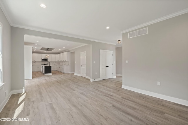 1808 2nd Ave, Toms River, NJ 08757 - unfurnished living room featuring recessed lighting, ornamental molding, and light wood-type flooring