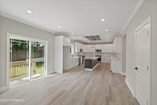 1808 2nd Ave, Toms River, NJ 08757 - kitchen with stainless steel appliances, ornamental molding, decorative backsplash, recessed lighting, and light countertops