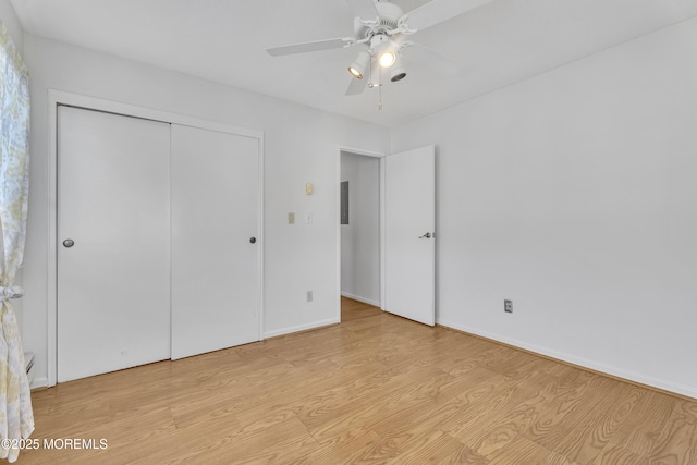 50 Valentine St Unit 14B, Monmouth Beach, NJ 07750 - unfurnished bedroom featuring light wood-style flooring, a closet, ceiling fan, and baseboards