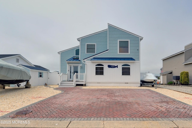 52 Benjamin Blvd, Manahawkin, NJ 08050 - view of front of house with a standing seam roof and metal roof