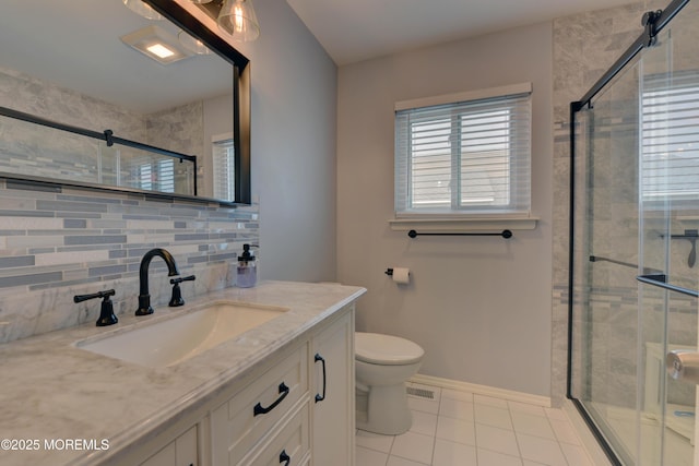 52 Benjamin Blvd, Manahawkin, NJ 08050 - bathroom featuring tile patterned floors, vanity, toilet, a stall shower, and baseboards