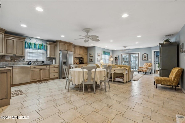 dining area featuring ceiling fan and recessed lighting