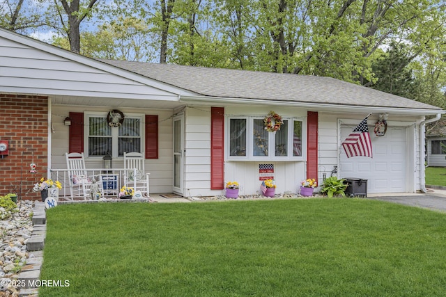 2 Oregon Dr Unit A, Whiting, NJ 08759 - view of front of property featuring covered porch, an attached garage, a front lawn, and roof with shingles