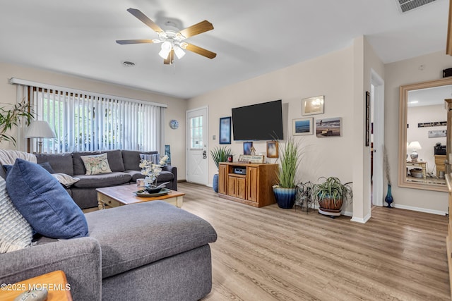 2 Oregon Dr Unit A, Whiting, NJ 08759 - living area with a ceiling fan, light wood-style floors, and baseboards