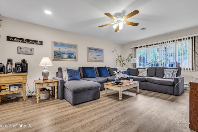 2 Oregon Dr Unit A, Whiting, NJ 08759 - living room with wood finished floors, ceiling fan, a baseboard heating unit, and recessed lighting