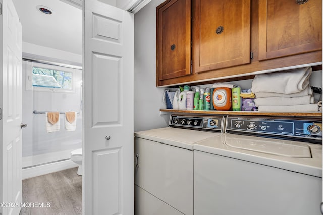 2 Oregon Dr Unit A, Whiting, NJ 08759 - laundry room with cabinet space, washer and clothes dryer, and light wood-style floors