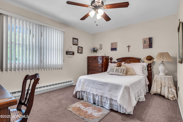2 Oregon Dr Unit A, Whiting, NJ 08759 - carpeted bedroom featuring a baseboard radiator and a ceiling fan