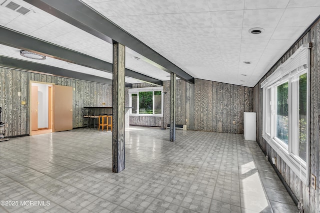 below grade area featuring wooden walls