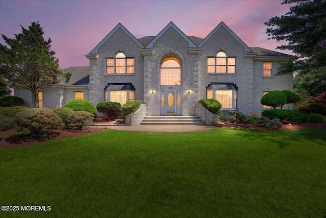 48 Joseph St, Manalapan, NJ 07726 - view of front of property with a front lawn and brick siding